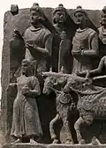 Students with their oblong palettes used for writing, in the Greco-Buddhist art of Gandhara. The young Buddha accompanying them to go to school is also part of the complete scene. 2nd-3rd century CE, Victoria and Albert Museum