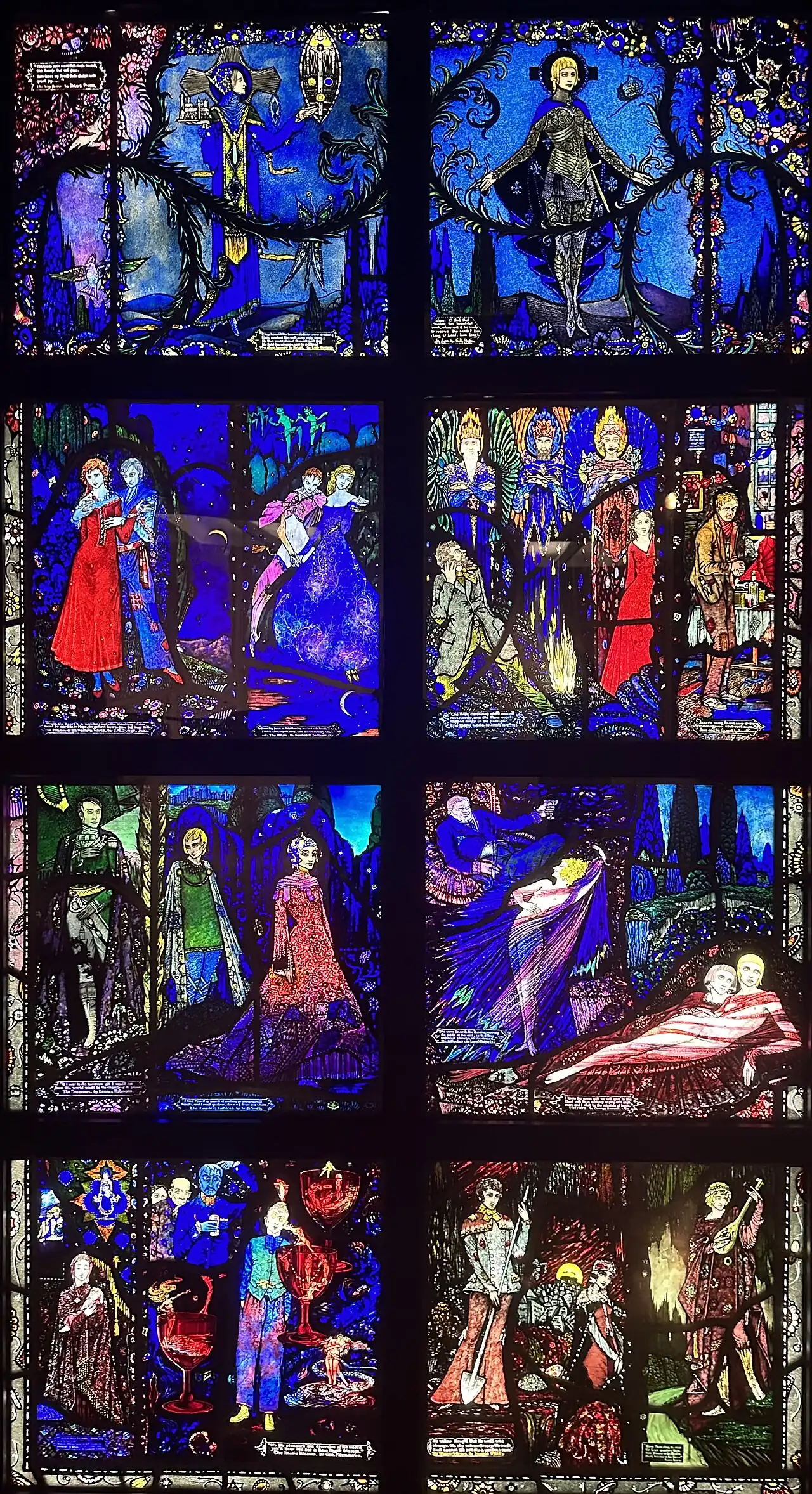 An 8-panel ornate stained glass window