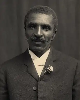 Image 16 George Washington Carver Photograph credit: Unknown; restored by Adam Cuerden George Washington Carver (1860s–1943) was an American agricultural scientist and inventor. Born into slavery in Diamond, Missouri, he was raised by his master Moses Carver after being emancipated, having been separated from his parents as an infant during a kidnapping incident. After college, Carver became a professor at Tuskegee Institute, where he developed techniques to improve soils depleted by repeated plantings of cotton. He wanted poor farmers to grow alternative crops, such as peanuts and sweet potatoes, as a source of their own food and to improve their quality of life. Carver spent years developing and promoting products made from peanuts, although none became commercially successful. Apart from his work to improve the lives of farmers, he was also a leader in promoting environmentalism. Carver received numerous honors for his work, including the NAACP's Spingarn Medal. In an era of very high racial polarization, his fame reached beyond the black community; he was widely recognized and praised in the white community for his many achievements and talents. In 1941, Time magazine dubbed Carver a "black Leonardo". This picture of Carver was taken around 1910 and is in the collection of the Tuskegee University archives. More selected pictures