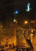 Statue from the bottom of the hill, night view