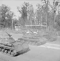 Soviet IS-3 heavy tanks driving down the Charlottenburger Chaussee in Berlin during the parade