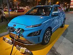 Getgo Carsharing's Hyundai Kona Electric car charging at a Royal Dutch Shell petrol station in Singapore.