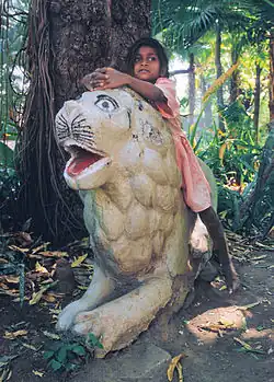 Image 19A girl in Udaipur playing "Jungle Child" (from Girls' toys and games)
