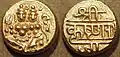 Golded coins during Krishnaraja Wadiyar III depicting Shiva holding his attributes of a trident and a deer, with his consort Parvati seated on his lap. The obverse reads: Sri Krishnaraja in Sanskrit