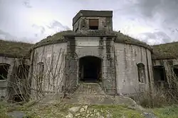 Entrance to the fort with concrete infantry position above