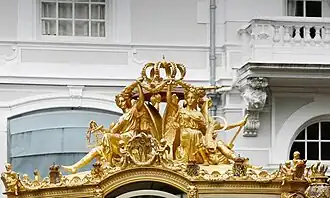 Gilded sculptures on top