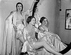 Two women wearing tap pants