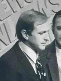 A black-and-white photo of Chapman with a pipe