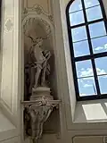 Fourth sculpture in the main staircase of the Palace