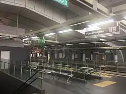 Signboards at this station are shown in grey, unlike most other stations, to show that it belongs to two lines, similar to the USJ 7 station on the Kelana Jaya Line