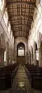 Nave looking from the chancel to the belltower and font