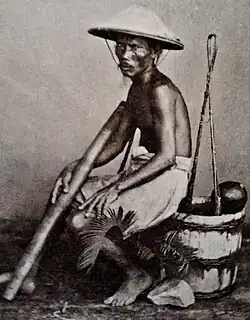 Merchant with opium pipe