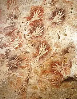 Image 45Hand stencils in the "Tree of Life" cave painting in Gua Tewet, Kalimantan, Indonesia (from History of painting)