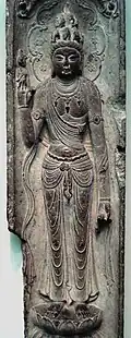 Tang dynasty (618-907) Chinese limestone-carved relief of Shiyimian Guanyin from Xi'an, Shaanxi, China. Held at the Freer Gallery of Art in Washington, USA.