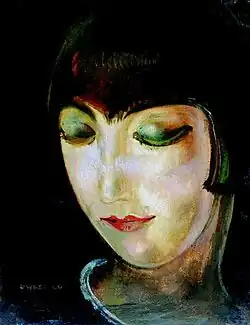 A painting of Kiki's face in green and yellow hues by Gustaw Gwozdecki