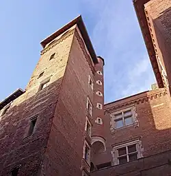 Street façades and tower.