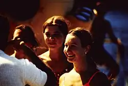 A young women, Alina Szmant, looks on with a smile.