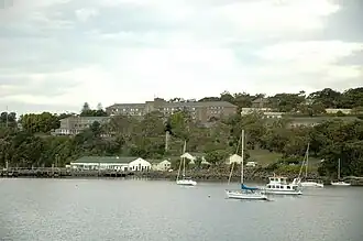 HMAS Penguin viewed across Middle Harbour from Balmoral Beach.