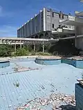 Ruin of Haludovo Palace Hotel as seen from pool area