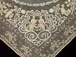 Handkerchief embroidery detail of cultural scenes