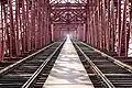 Image 17Hardinge Bridge is a steel railway bridge over the river Padma located at Paksey, Ishwardi, Pabna in western Bangladesh. It is named after Lord Hardinge, who was the Viceroy of India from 1910 to 1916. The bridge is 1.8 kilometres (1.1 mi) long. Photo Credit: Azim Khan Ronnie