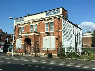 standalone Victorian red brick pub building