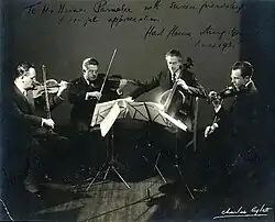 Hart House String Quartet in their 1935 configuration (James Levey, Milton Blackstone, Boris Hambourg and Harry Adaskin). The photograph is signed for their Manager Horace Parmalee.