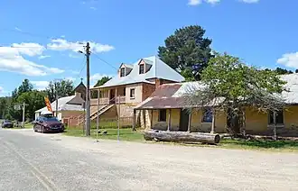 The main street of Hartley, showing the Shamrock Inn, Ivy Cottage and the Farmer's Inn
