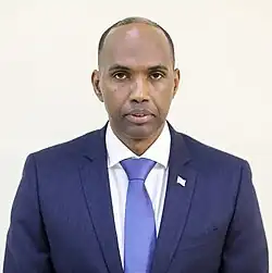 Photograph of Khaire slightly smiling