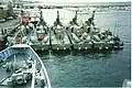 Five Hauk-class patrol boats at quay in 2001, viewed from HNoMS&nbsp;Horten. To right of the Hauk-class vessels is a CB90-class fast assault craft.
