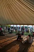 Attendees inside the tent