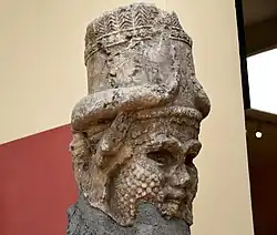Marble lamassu head fragment from ancient Assur
