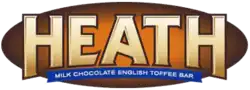 A toffee chocolate candy bar, unwrapped and cut in half