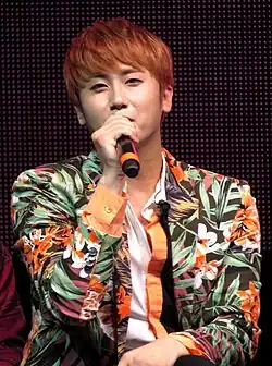 Heo at a fan meeting in 2013