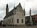 The old town hall and the Monument for the 'Farmers Rising'