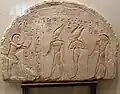 Upper part of the Stela of the commander chief Horemheb (later king) with the depiction of him in front of gods: Atum, Osiris, Ptah-Sokar. Found in his Memphite tomb in Saqqara Limestone. Dynasty XVIII, reign of Tutankhamun. Third quarter of the 14th century BC. Saqqara