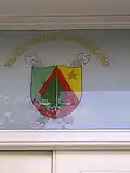 The Coat of arms of Cameroon above the entrance