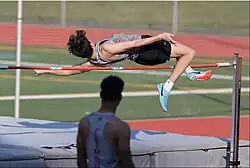 Image 18A high school student attempting to high jump while using the Fosbury Flop technique (from Track and field)