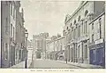 Rugby High Street in 1893, the building second to the right was the first Town Hall of 1857. Destroyed by fire in 1921.
