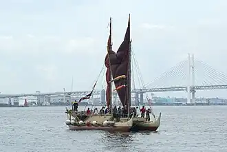 Hokule'a with her kaula pe'a (sail lines) tightened to partly close her crab-claw sails[17]