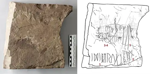 A colour photograph and drawing of the Hole 2 fragment