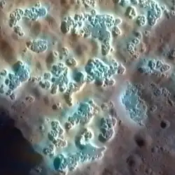 Hollows on Mercury. Colors are enhanced. Width of the image is 7&nbsp;km.