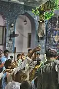 Devotees regard water at the site to be blessed.