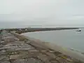 The breakwater seaward from the land end.