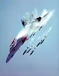 F-A-18E Super Hornet releases MK-83 1000 pound bombs during ATFLIR tests.