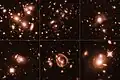 The lensing phenomenon allows for features as small as about 100 light-years or less.[56]