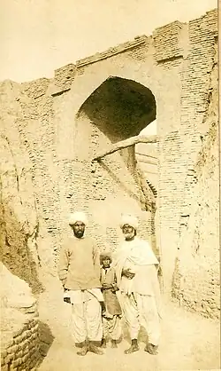 Two Sindhi muslim men in Sindhi Salwar/Suthan and Pehriyan with Sindhi Patko (turban) and Loi (winter shawls)