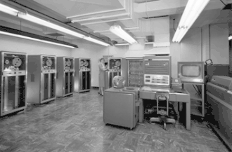 An IBM 704 mainframe with IBM 727 tape drives on the left. (image courtesy of LLNL)