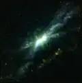 MUSE image of the X-shaped EELR and other emission features near the nucleus. Oxygen is blue, Hydrogen-alpha is orange, sulfur is green