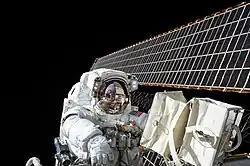 Scott Kelly working outside of the International Space Station